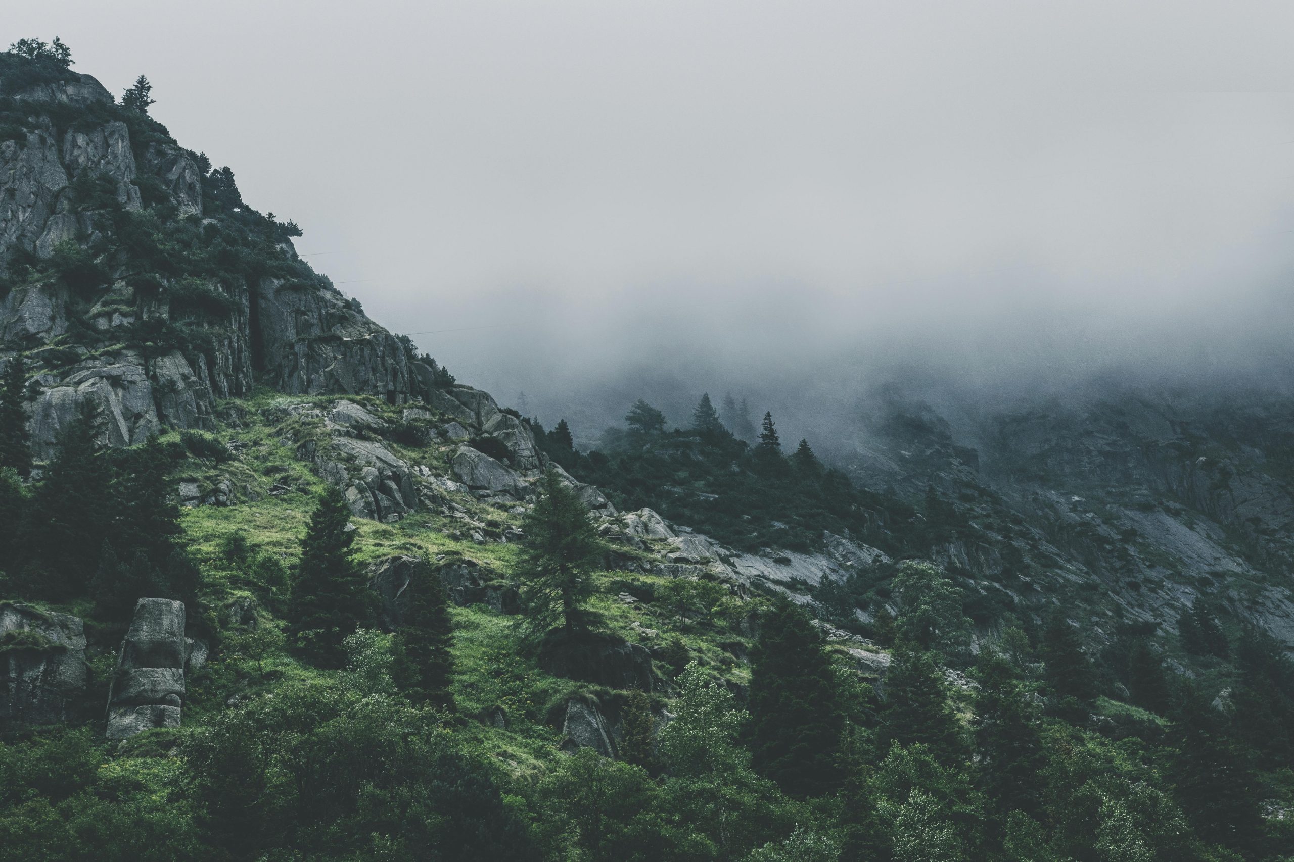 a picture of foggy mountains