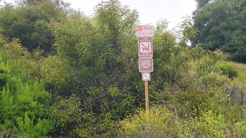 parking sign at small lot off Entrada Road